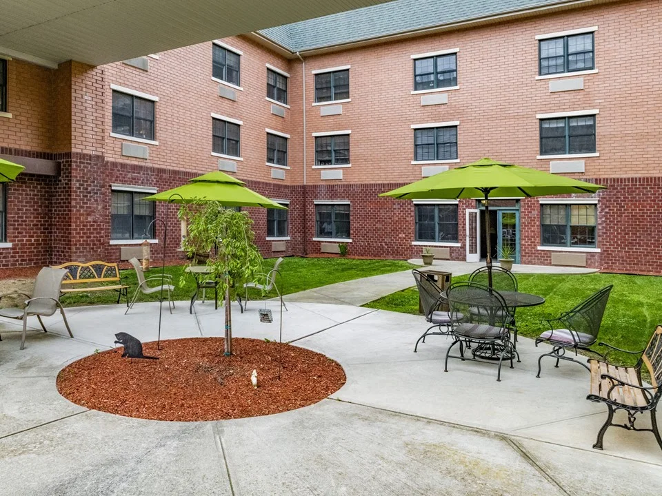 HOLIDAY MANOR AT WOODSIDE