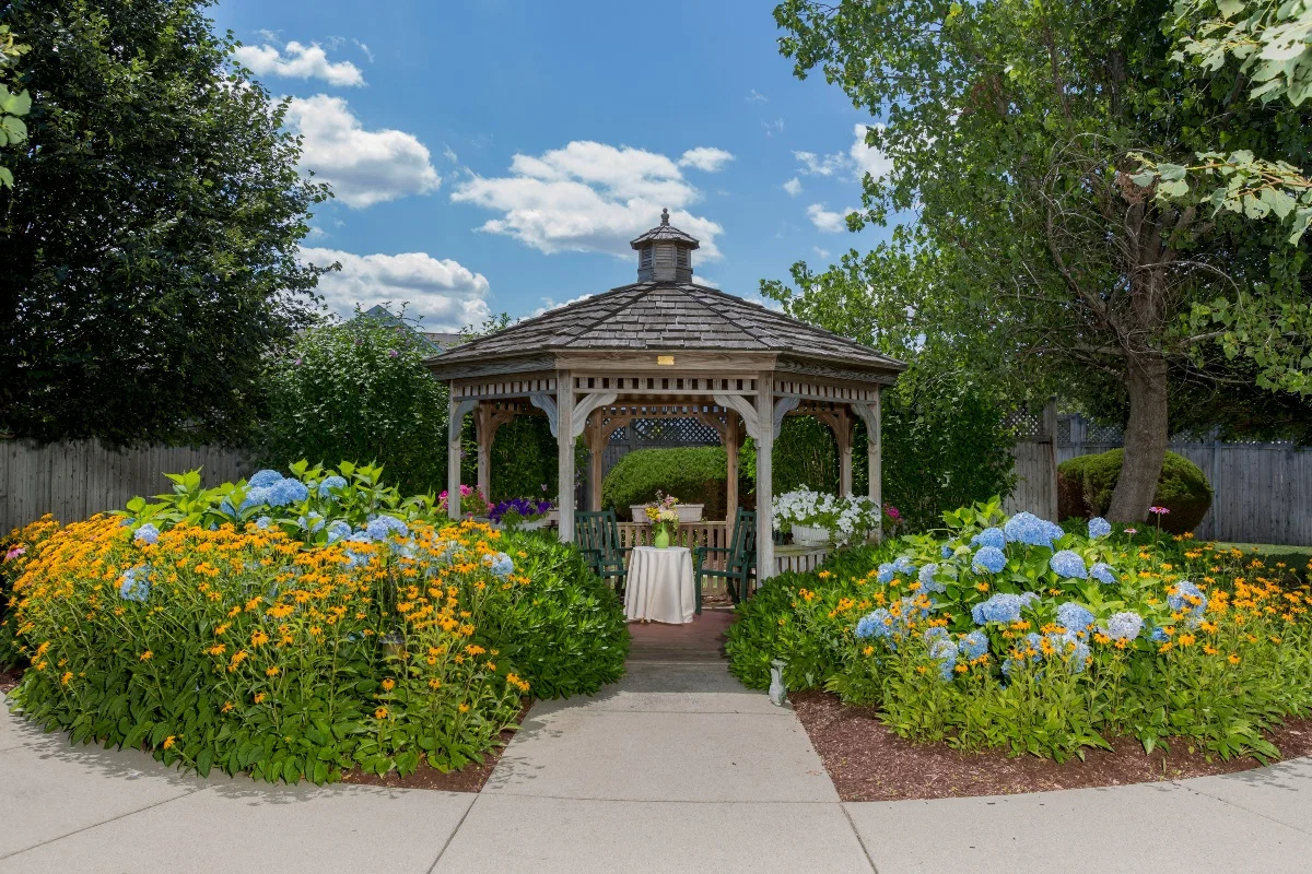 THE ATRIUM AT FAXON WOODS