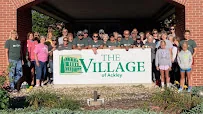 THE VILLAGE OF ACKLEY