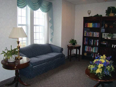 WOLCOTT HALL NURSING CENTER INC